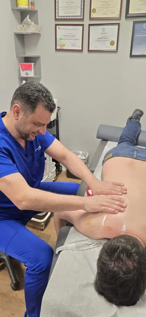Our physiotherapist performing physiotherapy for back pain in Brampton